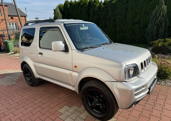 Suzuki Jimny cena 33900 przebieg: 166000, rok produkcji 2011 z Radomsko małe 497